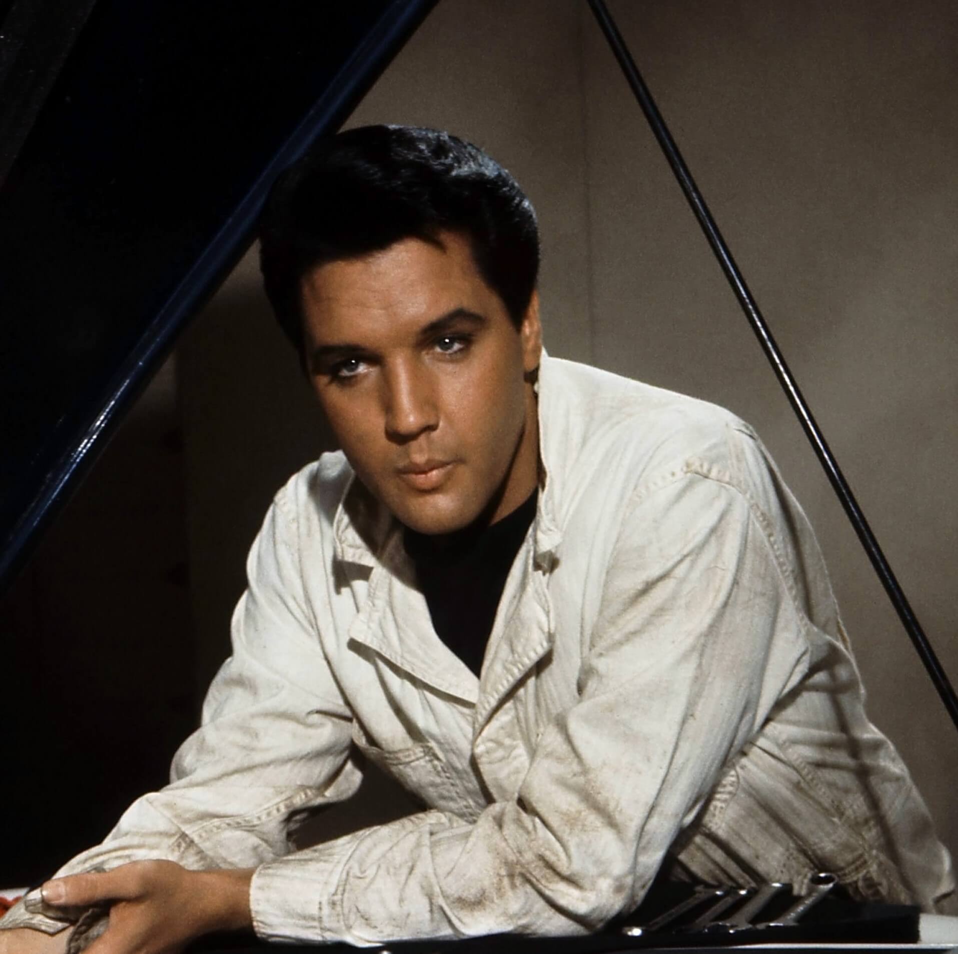 Elvis Presley wearing white