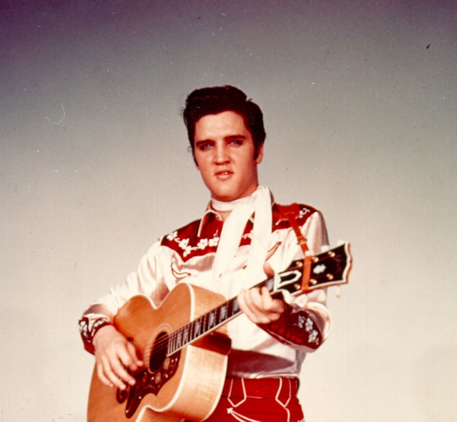 Elvis Presley with a guitar