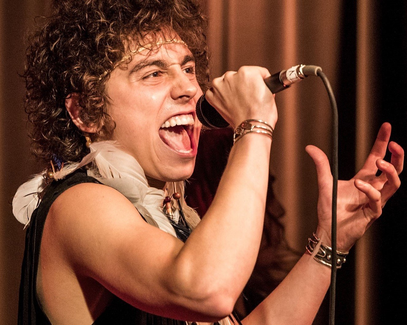 Greta Van Fleet's Josh Kiszka with a microphone