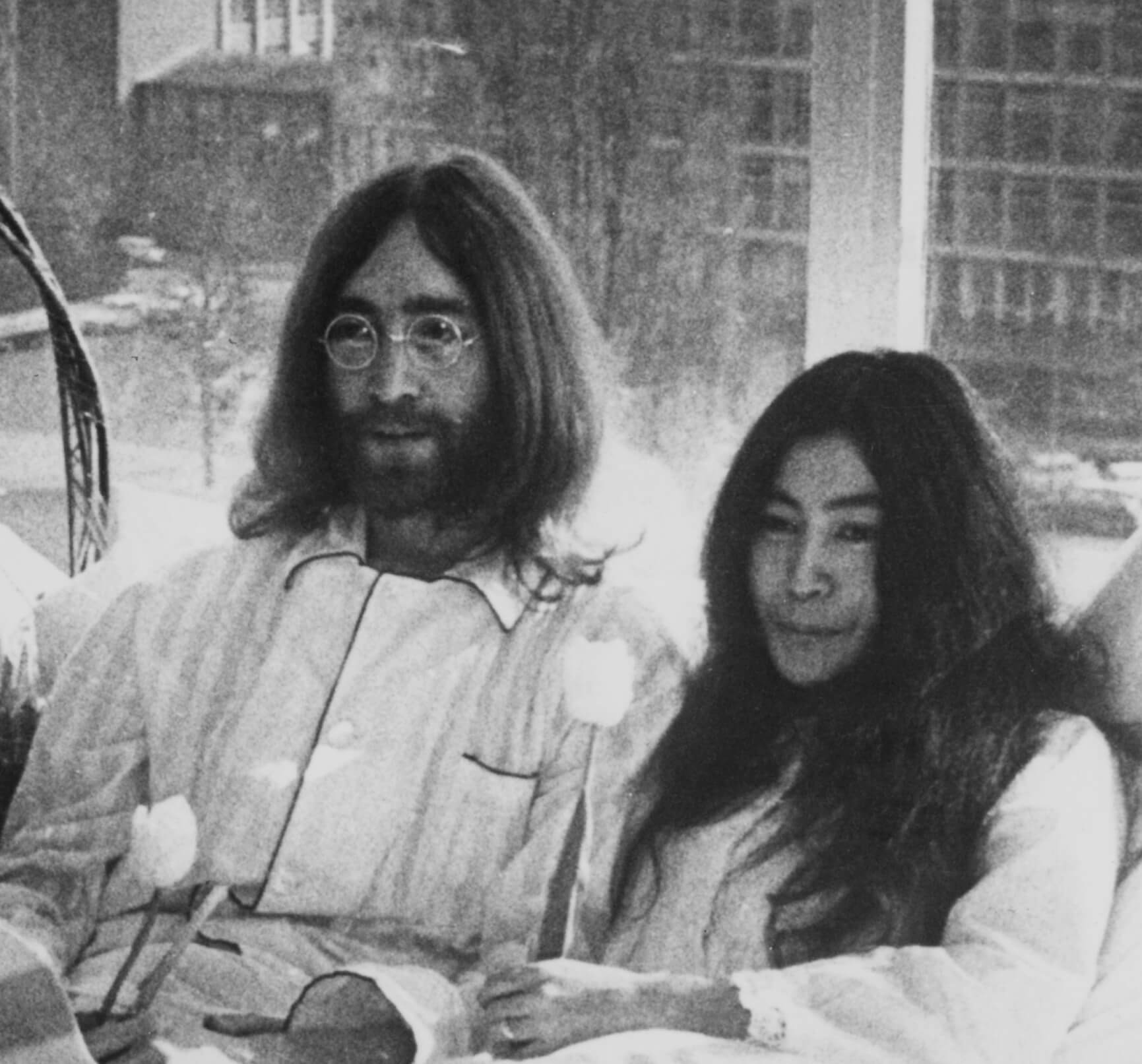 John Lennon and Yoko Ono in bed