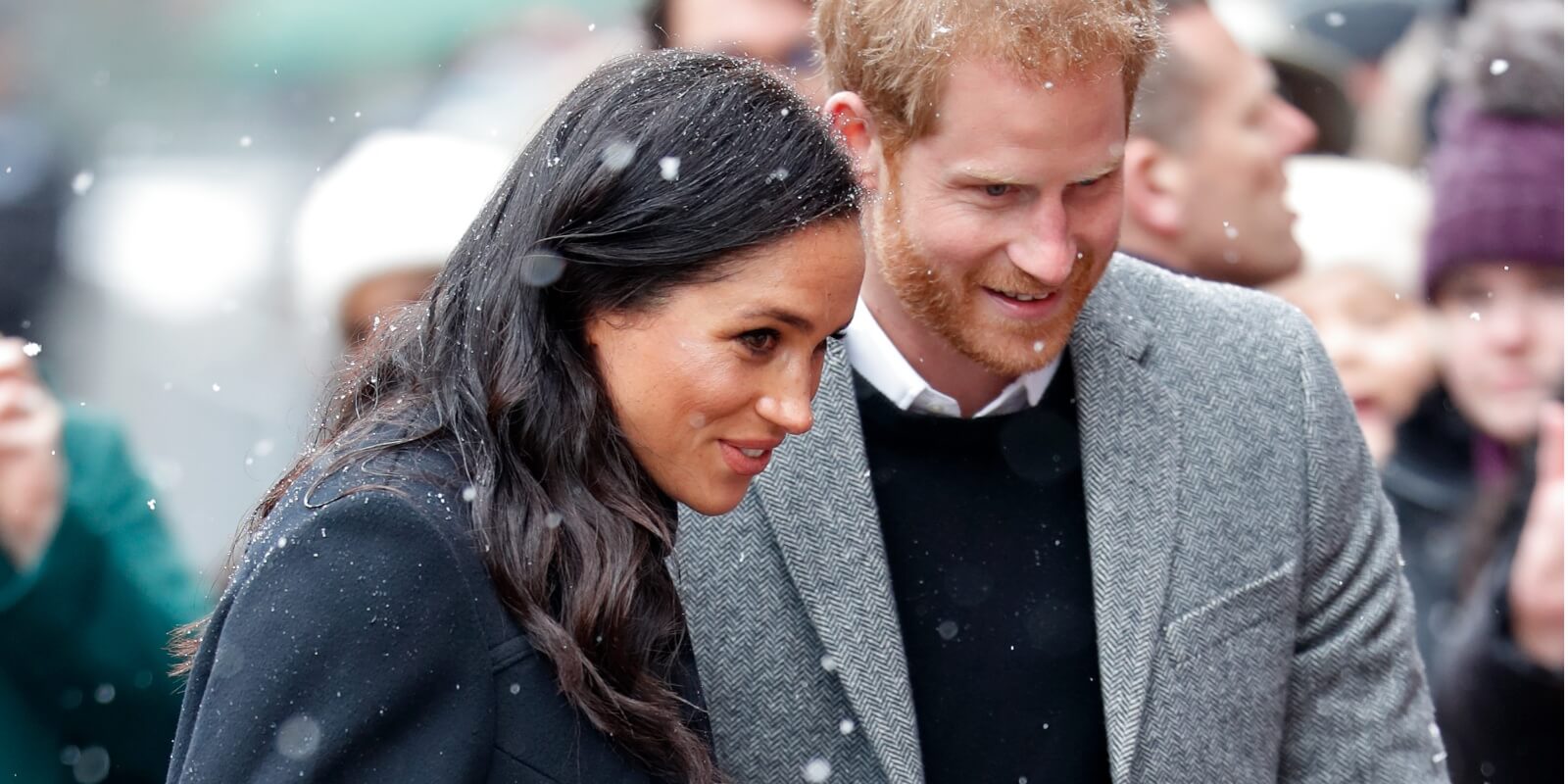 Meghan Markle and Prince Harry walk in the snow for a visit to the Bristol Old Vic on February 1, 2019 in Bristol, England.