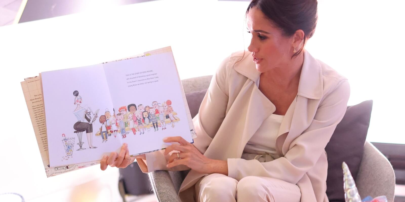 Meghan Markle reads a book to children during a visit to Germany for the Invictus Games in 2023.