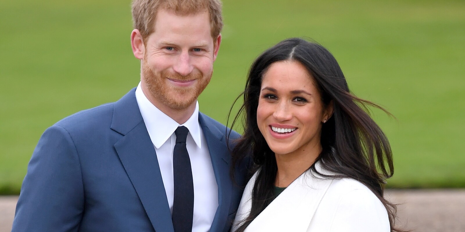 Prince Harry and Meghan Markle pose for photographers in 2017.