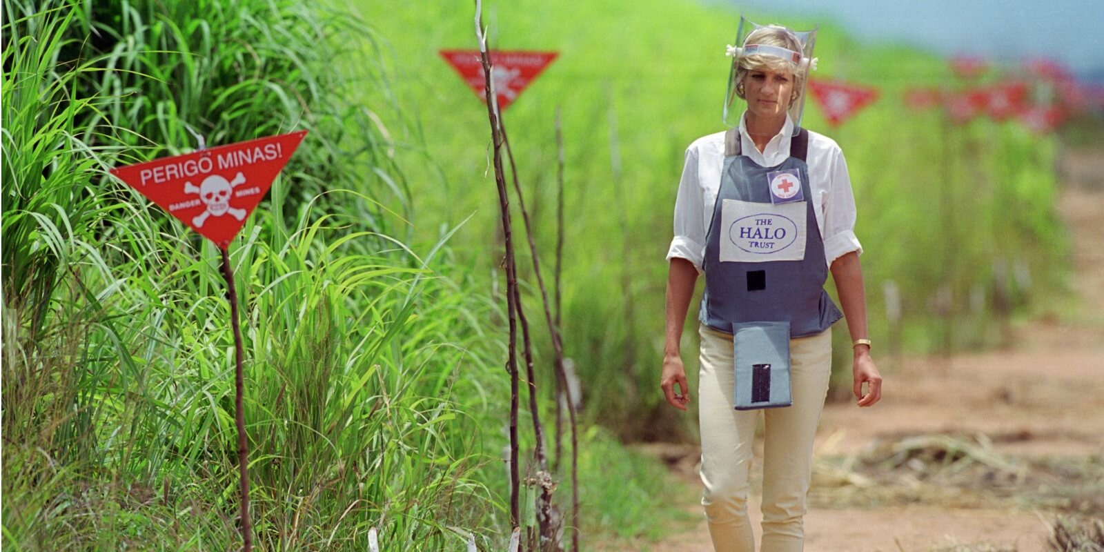 Princess Diana draws attention to the problem of landmines in Africa.