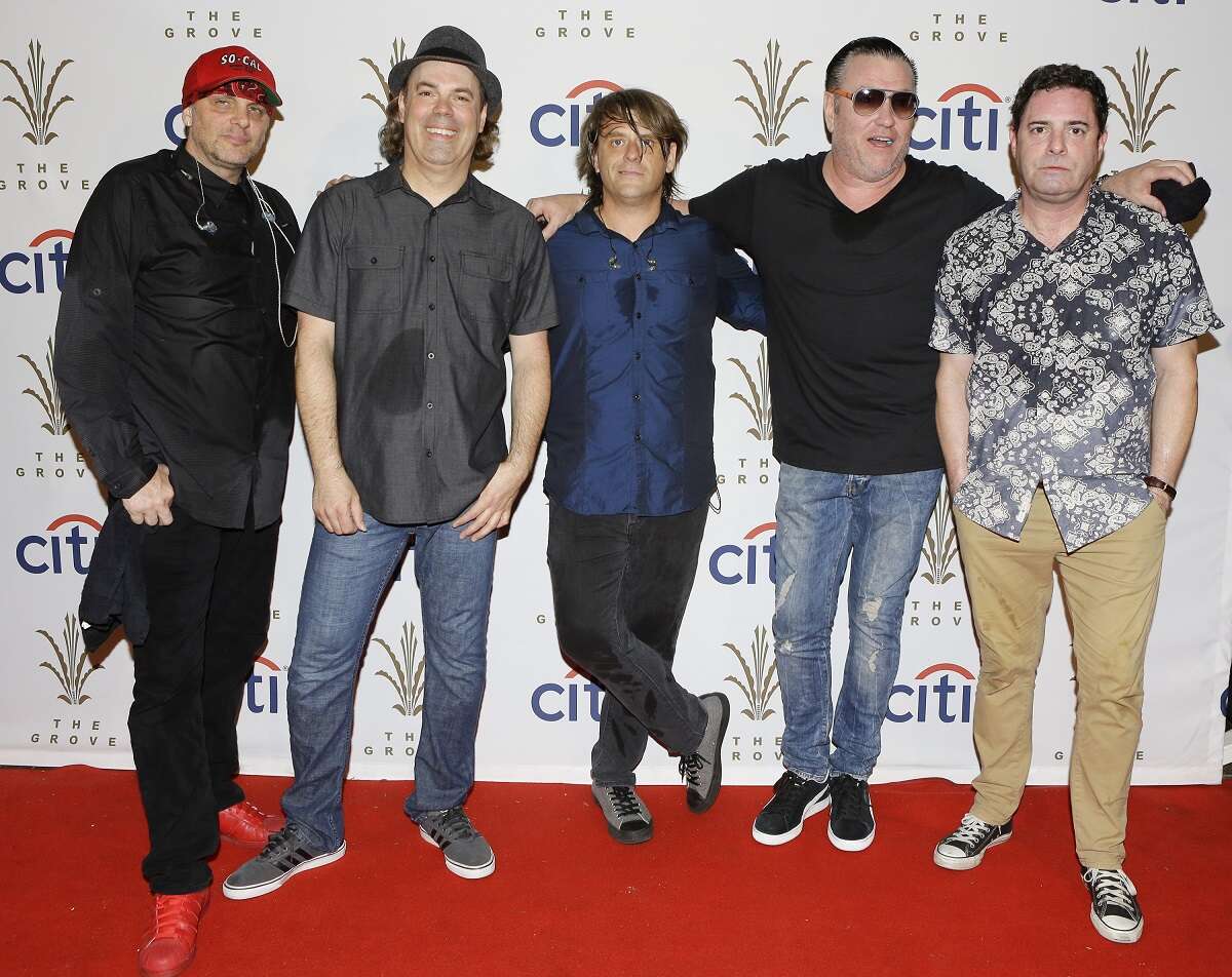 Drummer Randy Cooke (L), bassist Paul De Lisle (2nd from L), keyboard player Michael Klooster (center) and frontman Steve Harwell of Smash Mouth pose together at The Grove in 2016. The group performed during the Summer Concert Series