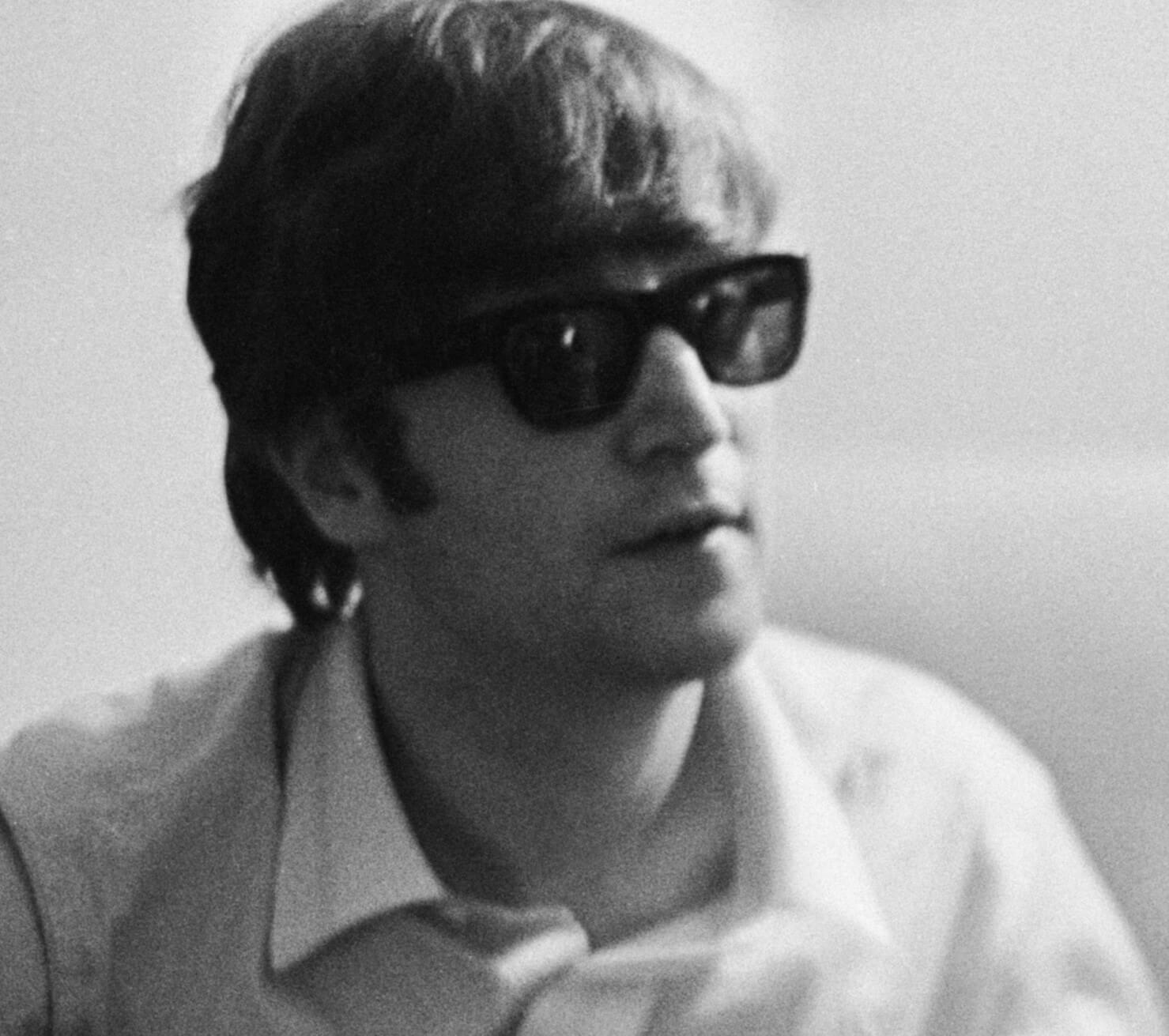 The Beatles' John Lennon wearing glasses