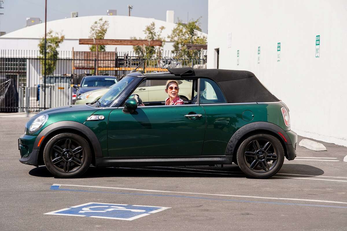 Anne Heche behind the wheel of a green Mini Cooper in 2020. Two years later, Heche died from injuries sustained in a car accident in a different Mini Cooper