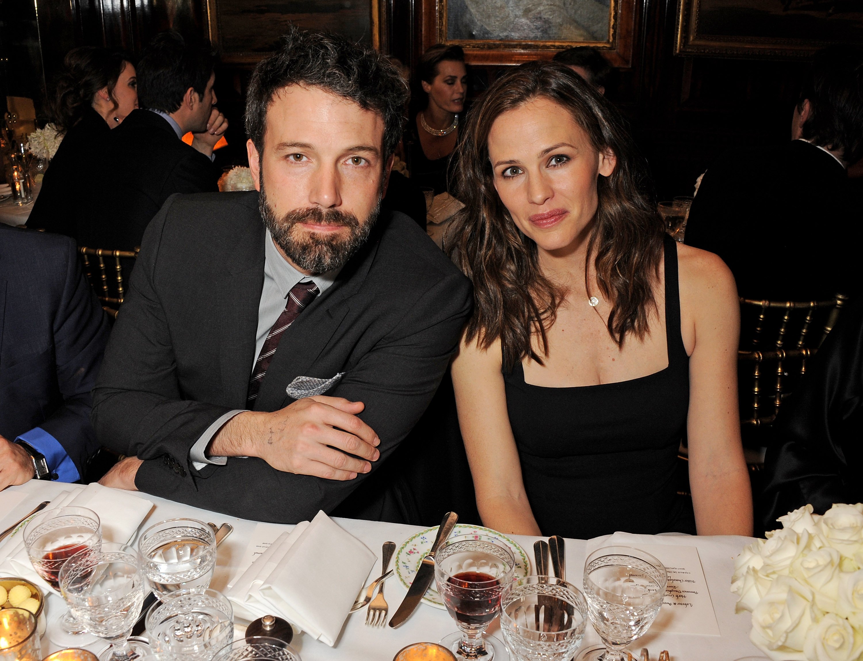 Ben Affleck and Jennifer Garner seated together at an event