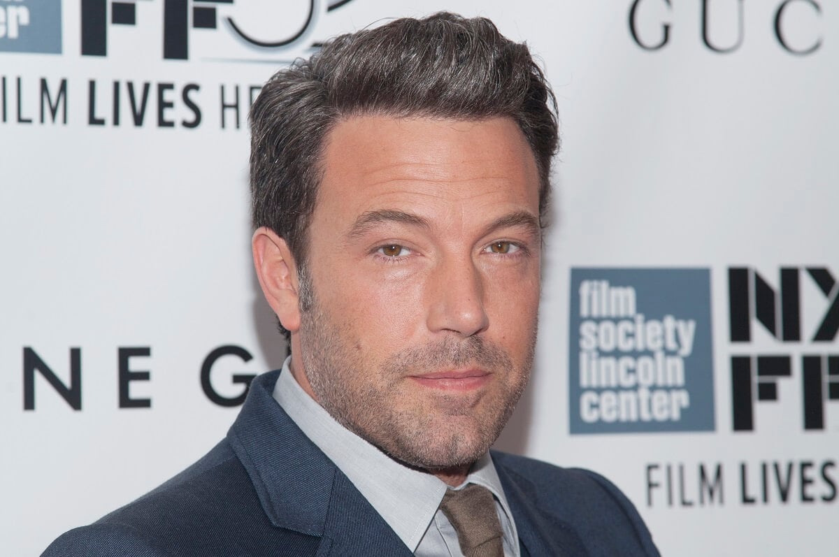 Ben Affleck posing at the 'Gone Girl' world premiere at the New York Film Festival in a suit.