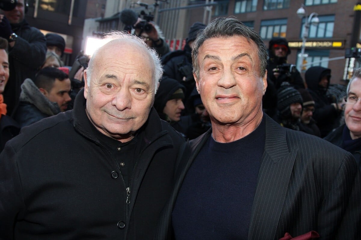 Burt Young and Sylvester Stallone posing at the opening of the 'Rocky' Broadway show.