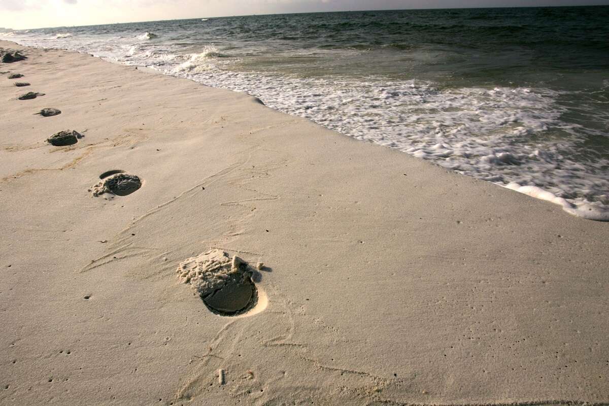 Footsteps are seen on the beach in Destin, Florida, the setting of the Duggar family beach vacation.