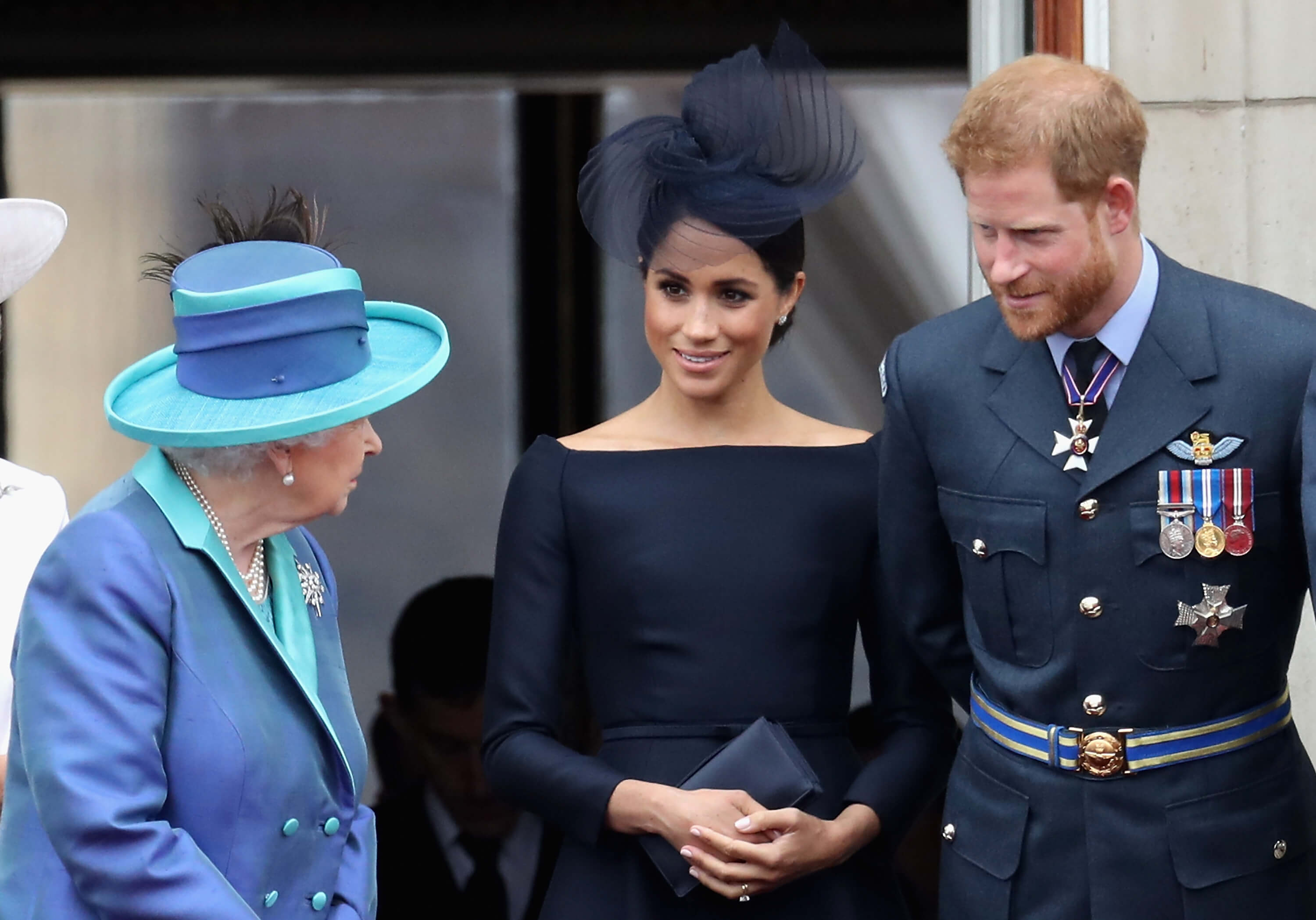 Queen Elizabeth talks to Prince Harry and Meghan Markle in 2018