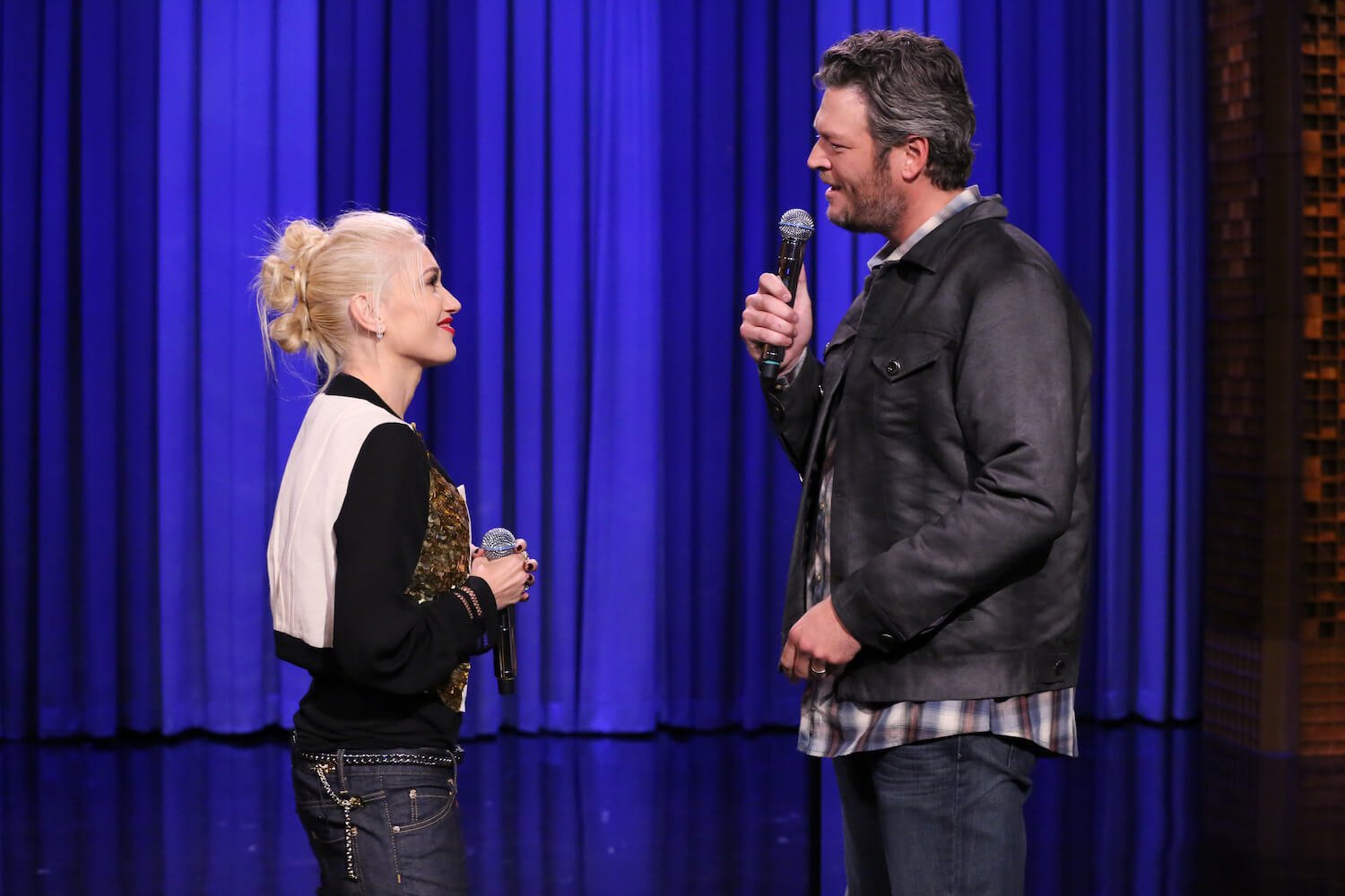 Gwen Stefani and Blake Shelton from 'The Voice' looking at each other