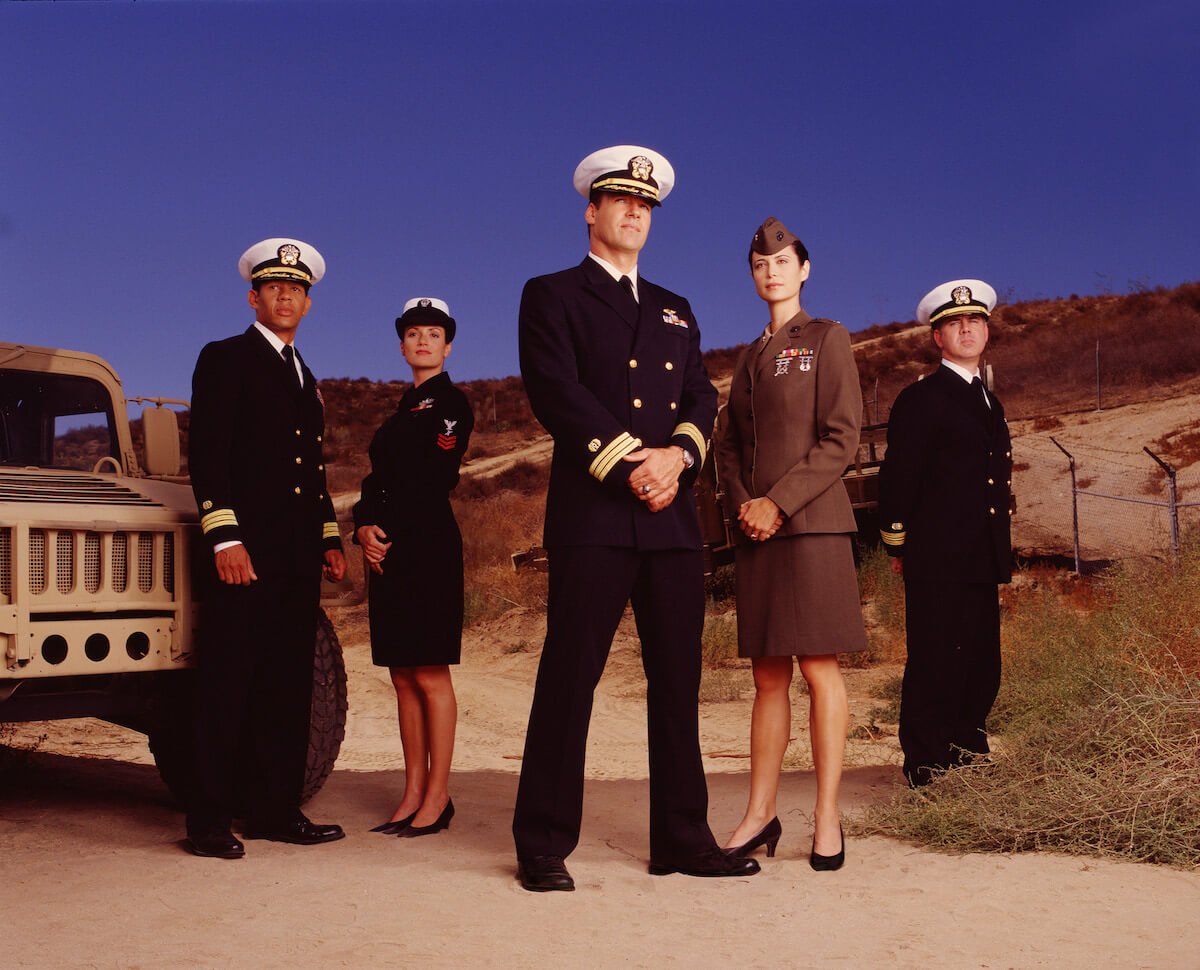 The cast of 'JAG' posing in military uniforms