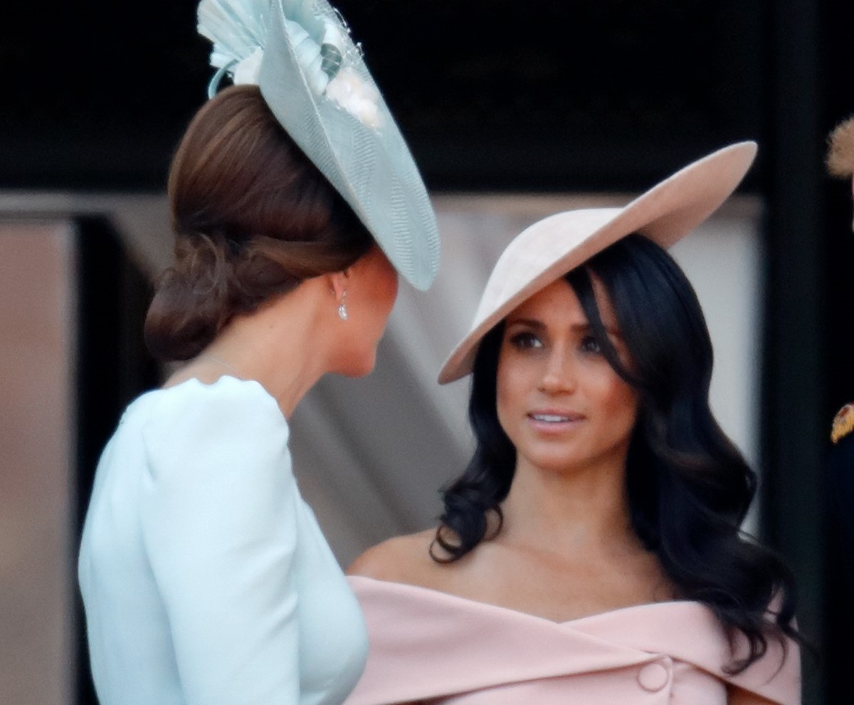 Kate Middleton and Meghan Markle standing on the balcony of Buckingham Palace during Trooping the Colour 2018