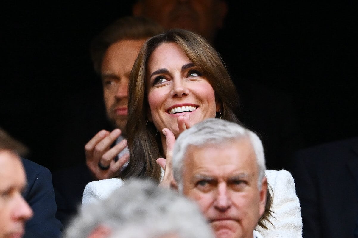 Kate Middleton, who has 'unleashed' her 'genuine' self via body language, claps
