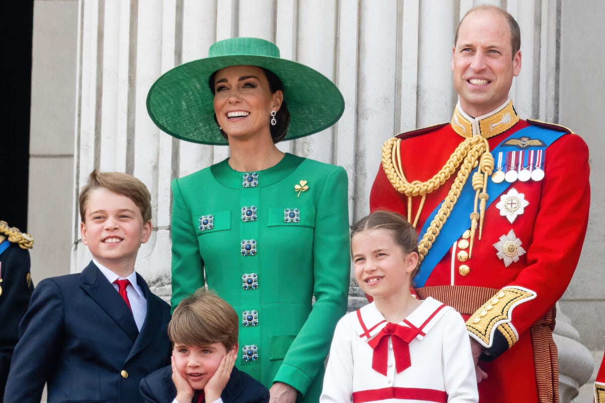 Kate Middleton, who won't be in Singapore for the 2023 Earthshot Prize Awards, stands with Prince George, Prince Louis, Princess Charlotte, and Prince William
