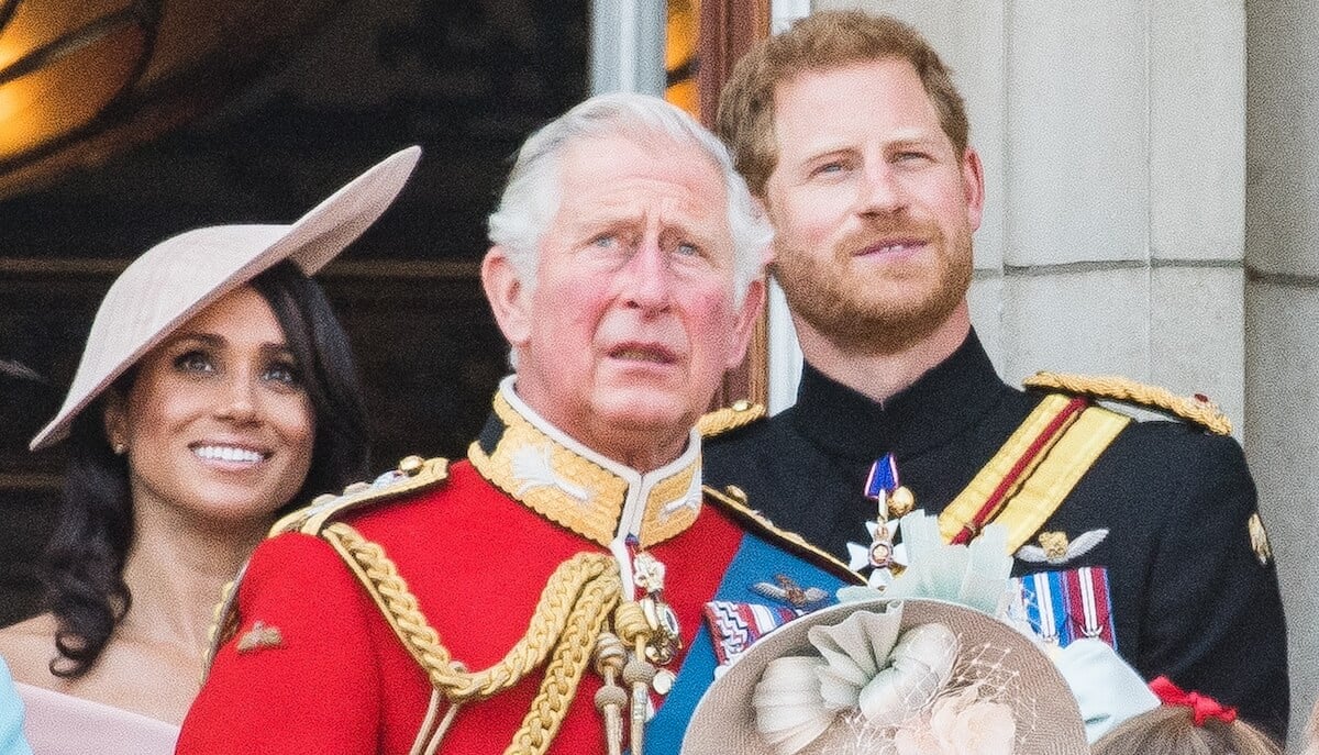 King Charles stands on the balcony of Buckingham Palace with Prince Harry and Meghan Markle in 2018