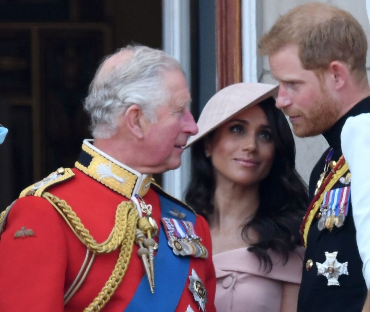 King Charles III, who has been warned not to stoop to Prince Harry and Meghan Markle's level, standing on the balcony of Buckingham Palace during Trooping The Colour 2018