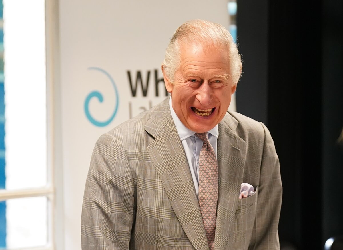 King Charles III, who made fun of himself over his pen incident, laughs during a visit to the Whittle Laboratory in Cambridge