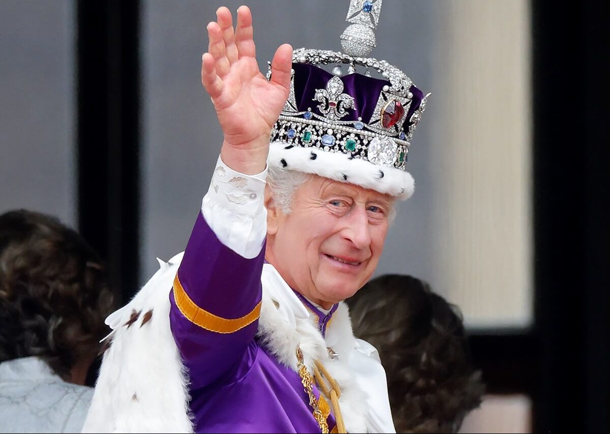 King Charles III, who once revealed what other job he'd be happy to have, waves from the balcony of Buckingham Palace following his coronation