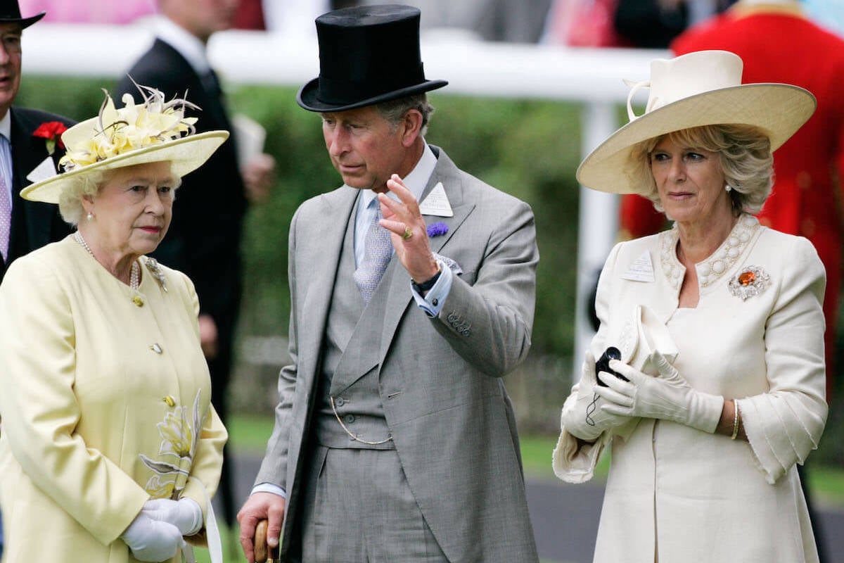 King Charles Queen Elizabeth, who had a 'rift' about Camilla Parker Bowles, stand with Queen Camilla