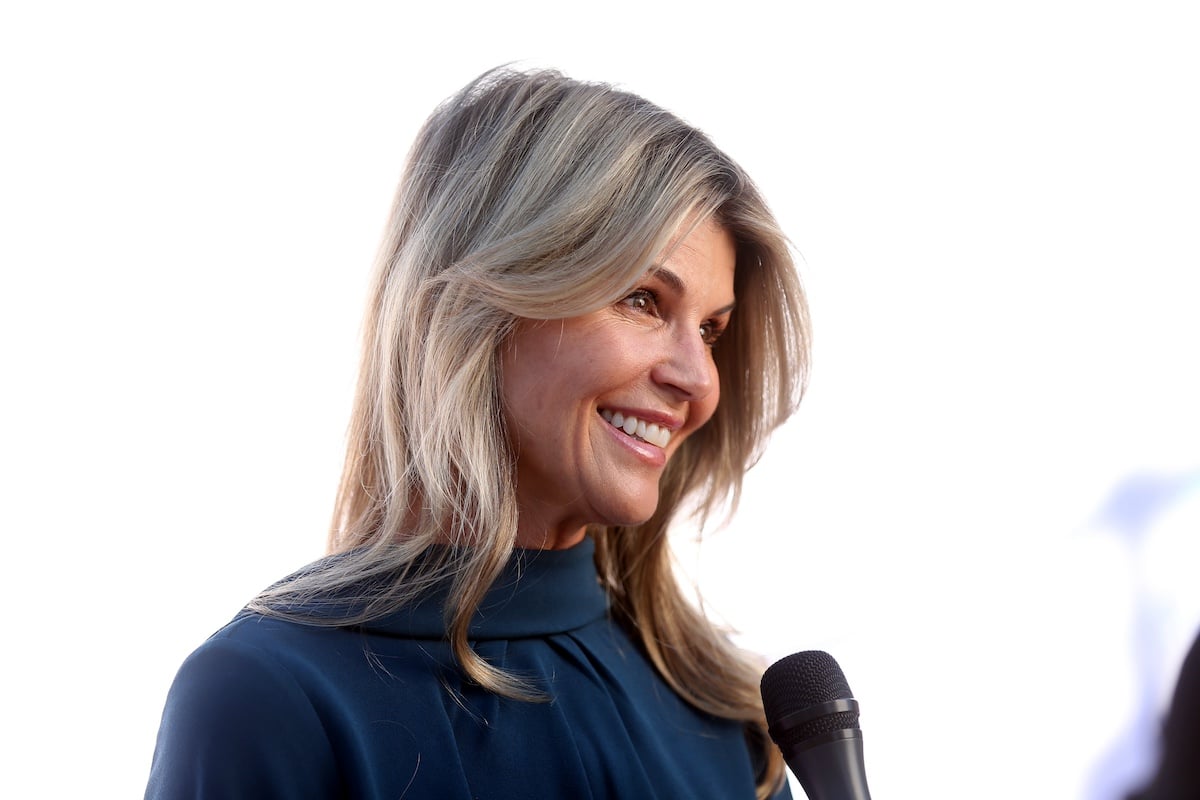 Smiling Lori Loughlin in profile in 2022