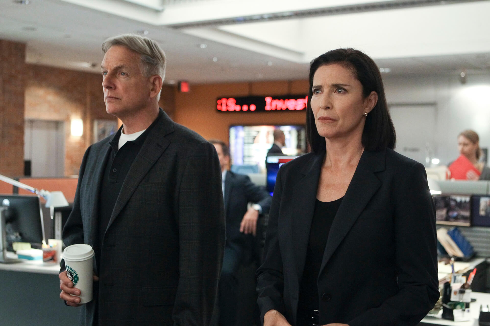 Mark Harmon and guest star Mimi Rogers standing next to each other in 'NCIS'