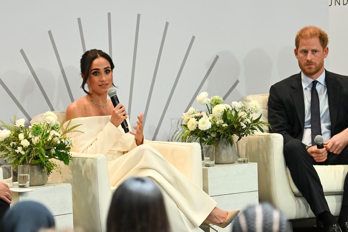 Meghan Markle and Prince Harry, who were seen at an airport in Atlanta, Georgia, speak in New York sitting next to each other