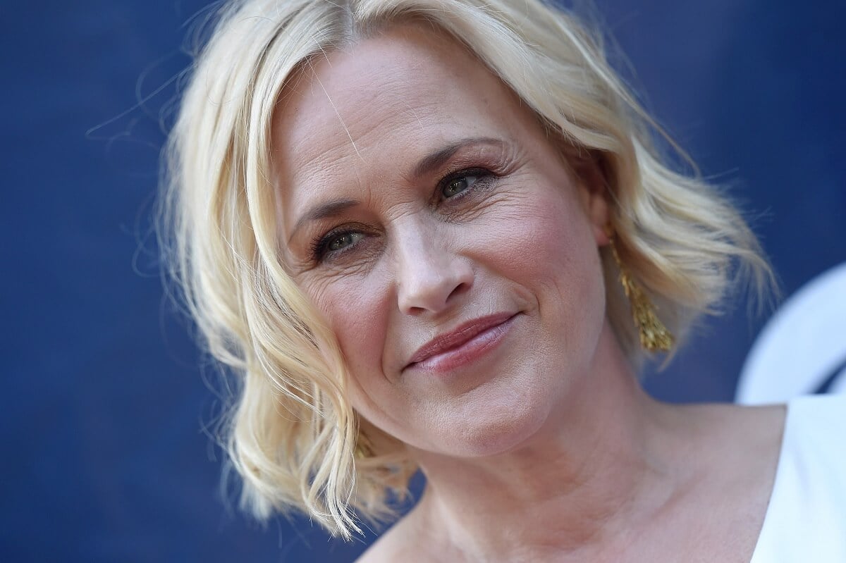 A picture of Patricia Arquette smiling while arriving at the at CBS, CW And Showtime 2015 Summer TCA Party.