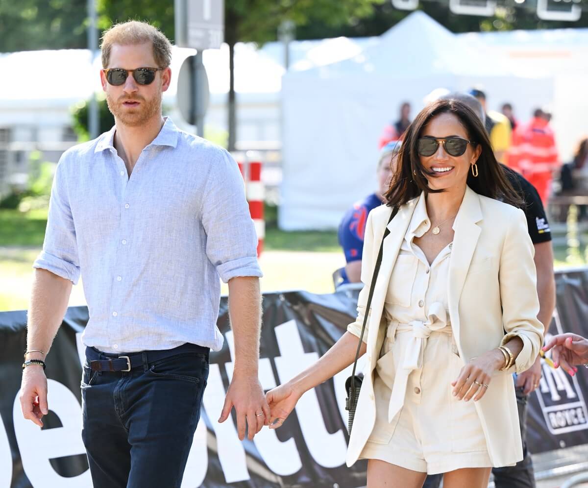 Prince Harry and Meghan Markle attend the cycling medal ceremony at the Cycling Track during the Invictus Games Düsseldorf 2023