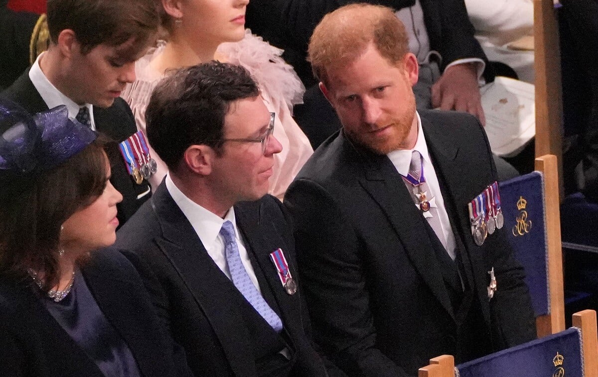 Prince Harry talking to Jack Brooksbank at the coronation ceremony of King Charles III and Queen Camilla