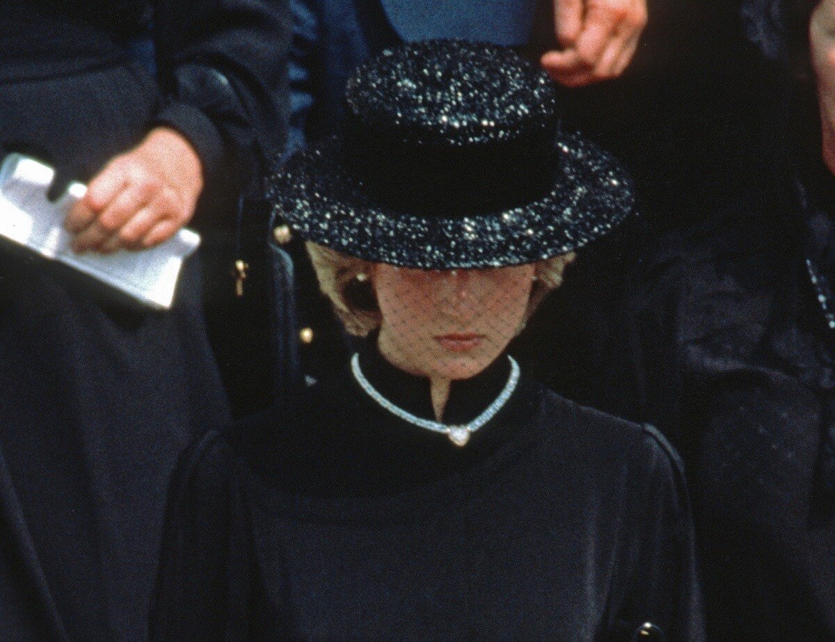 Princess Diana, whose sister-in-law shared photos of her final resting place, attends the funeral of Princess Grace of Monaco