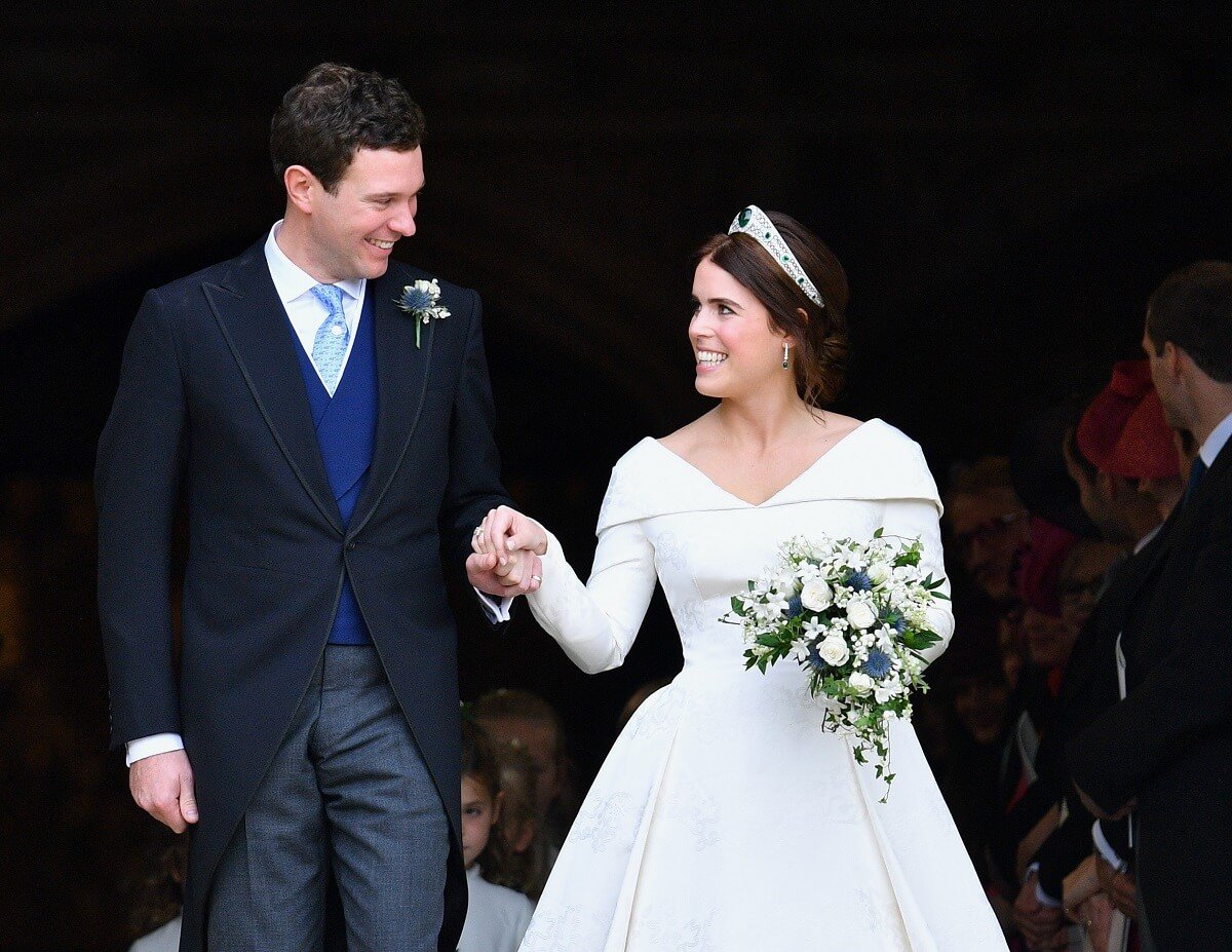 Jack Brooksbank and Princess Eugenie leave St. George's Chapel after their wedding ceremony