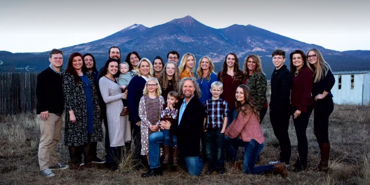 The Brown family of TLC's 'Sister Wives' pictured together in a family portrait before the demise of their plural unions.