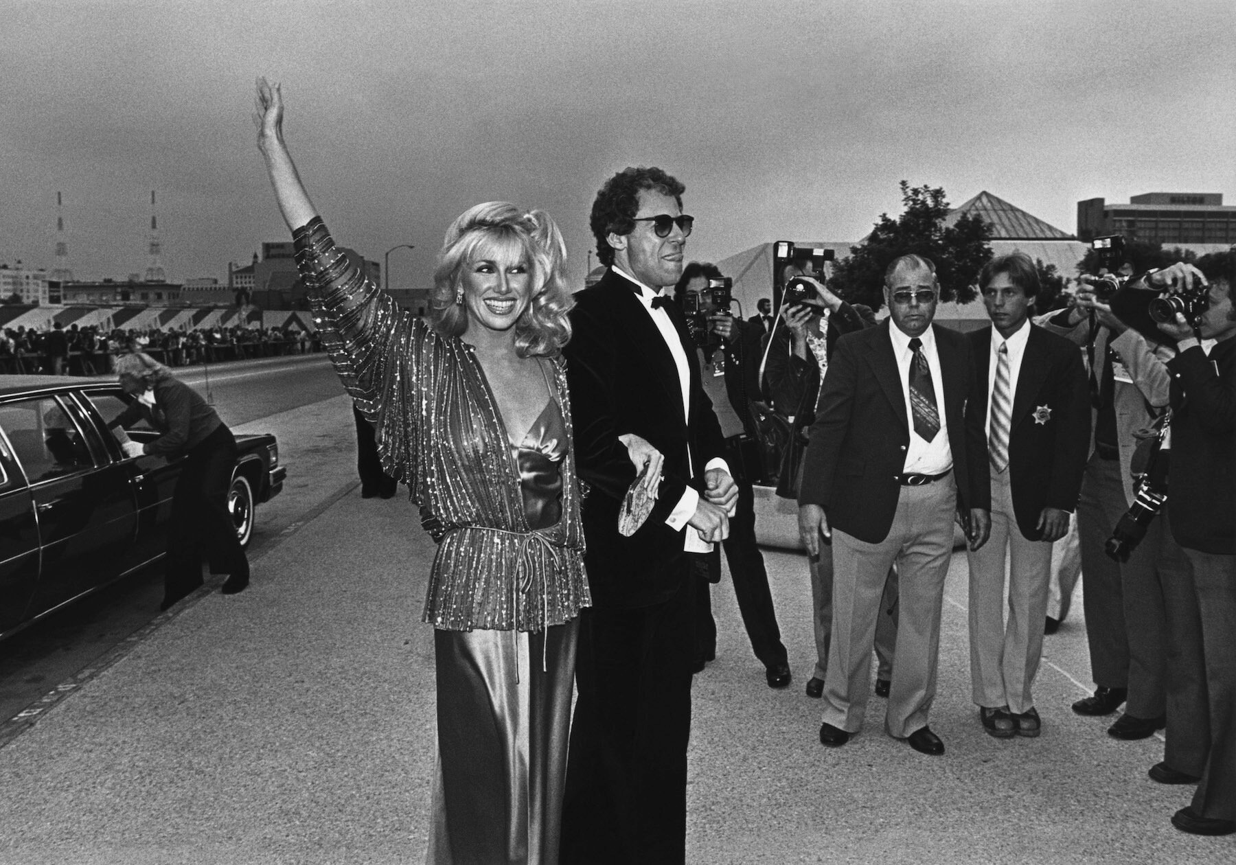 A black and white photo of Suzanne Somers and her husband Alan Hamel at the Emmy Awards in 1978