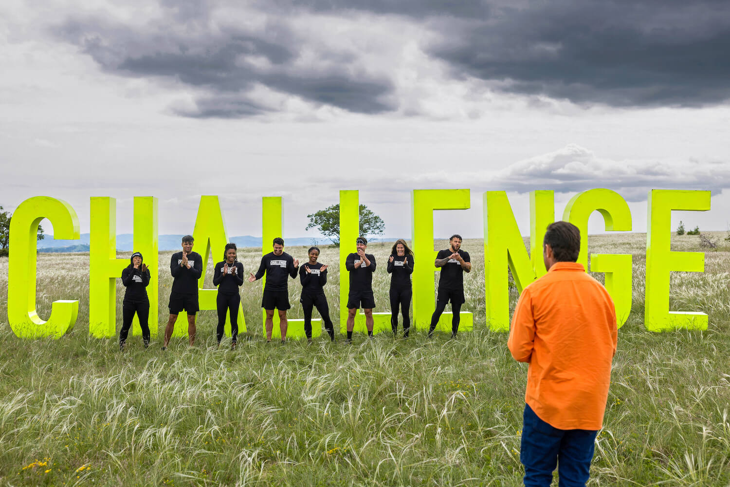 T.J. Lavin standing in front of competitors before 'The Challenge: USA' Season 2 finale. A winner is crowned on Oct. 19, 2023.