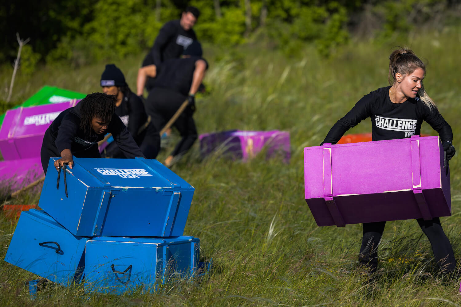 Competitors hauling large blocks in 'The Challenge: USA' Season 2 finale