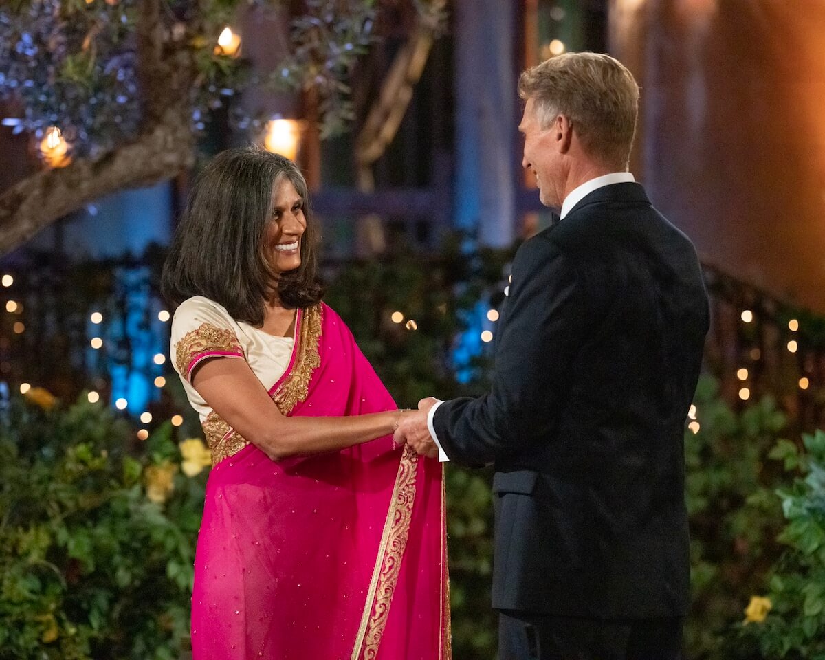 Marina, in a sari, holding hands with Gerry on 'The Golden Bachelor'