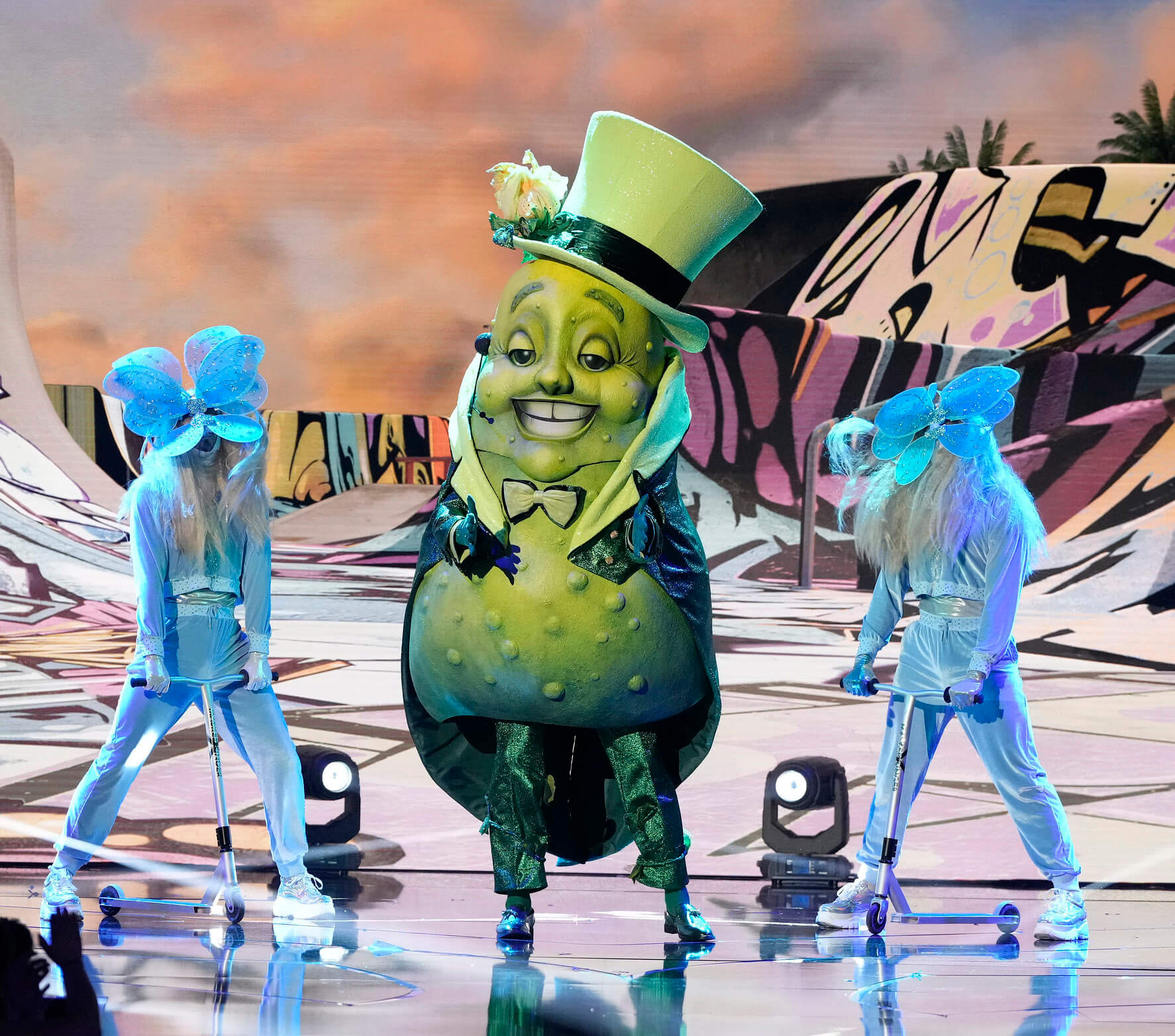 Pickle on stage with backup dancers in 'The Masked Singer' Season 10