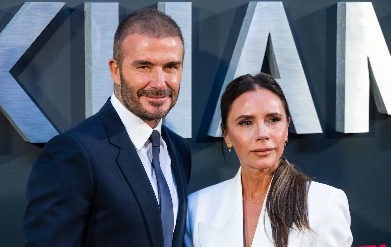 Victoria Beckham, who said the 'hardest' part of David Beckham marriage was 2003, stands with David Beckham at the 'Beckham' premiere