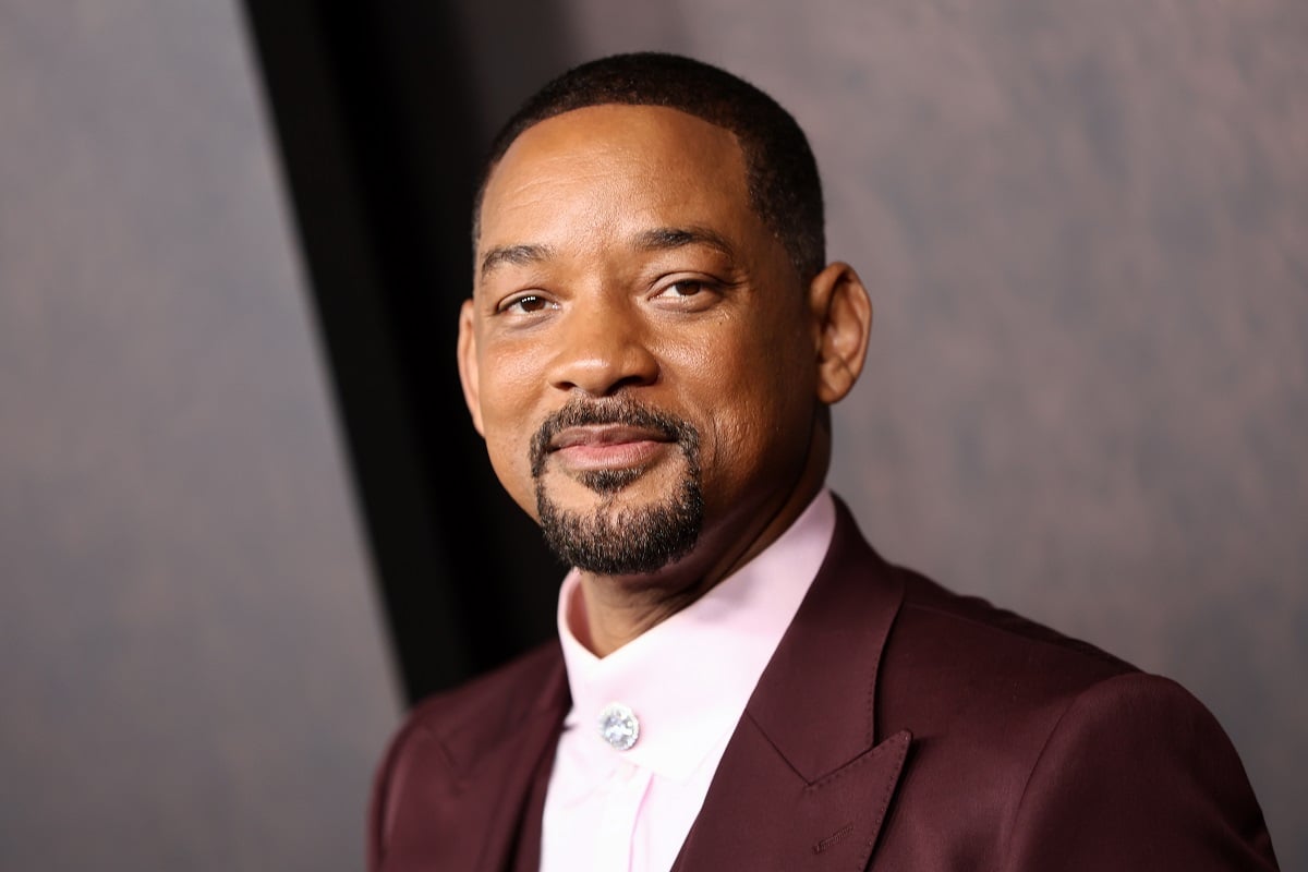 Will Smith posing at the premiere of 'Emancipation'.