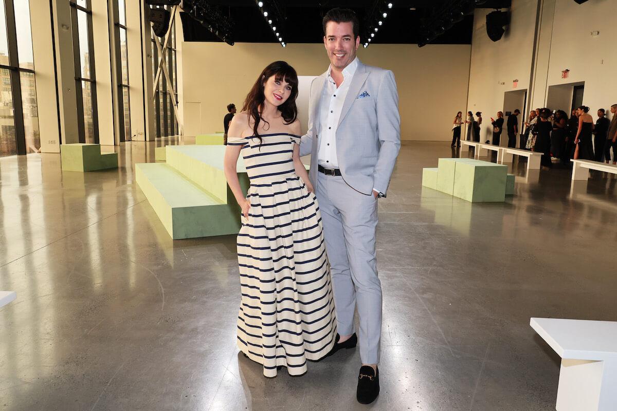 Zooey Deschanel, who knew Jonathan Scott was 'the one' before their first date, stands with the HGTV star