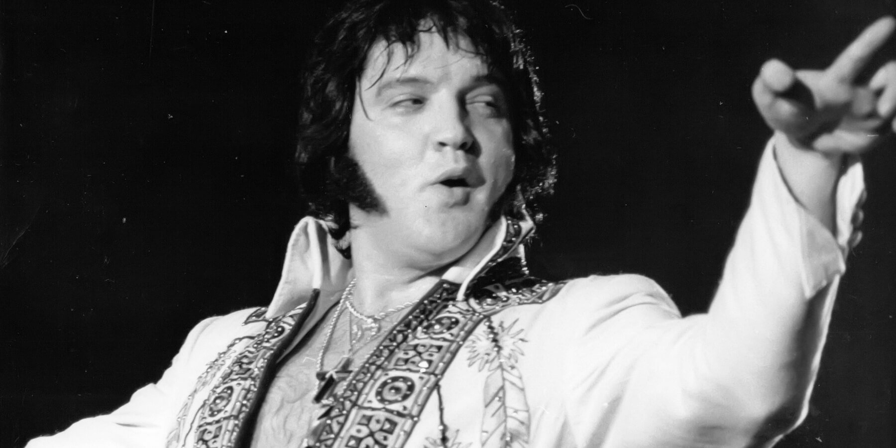 Elvis Presley performs in concert in 1977.