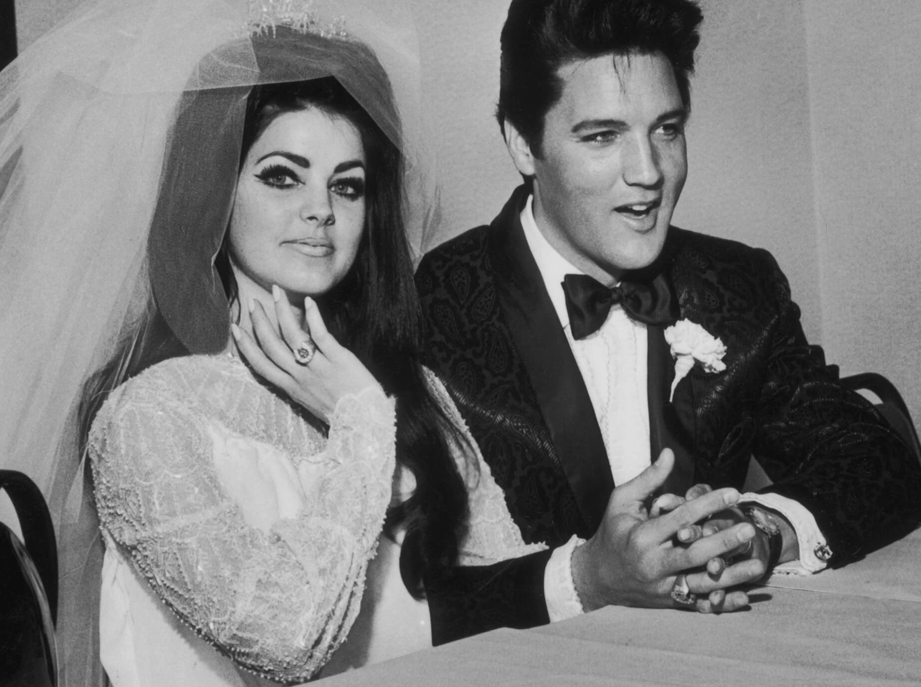 Priscilla and Elvis Presley on their wedding day