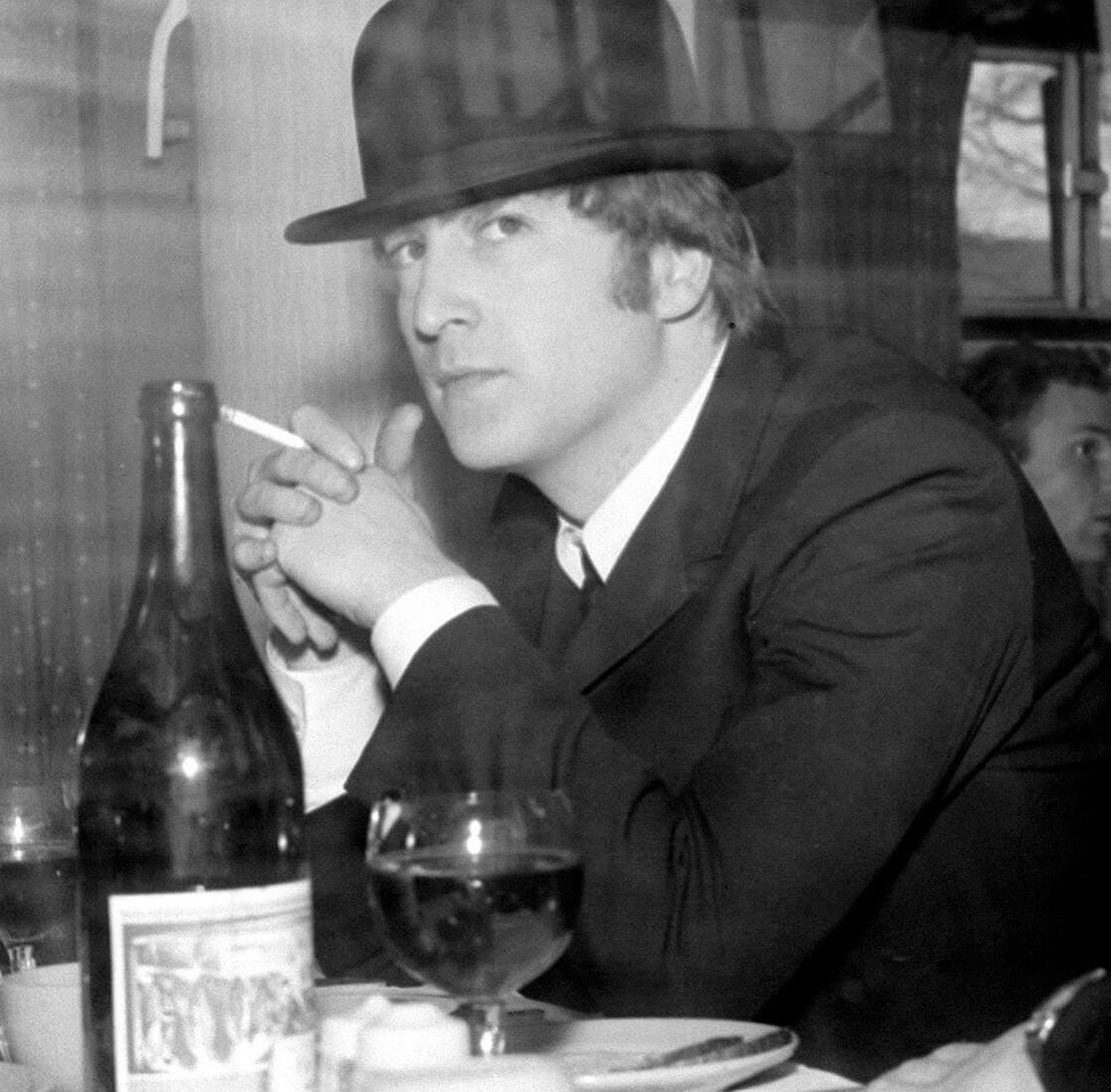 John Lennon wearing a hat