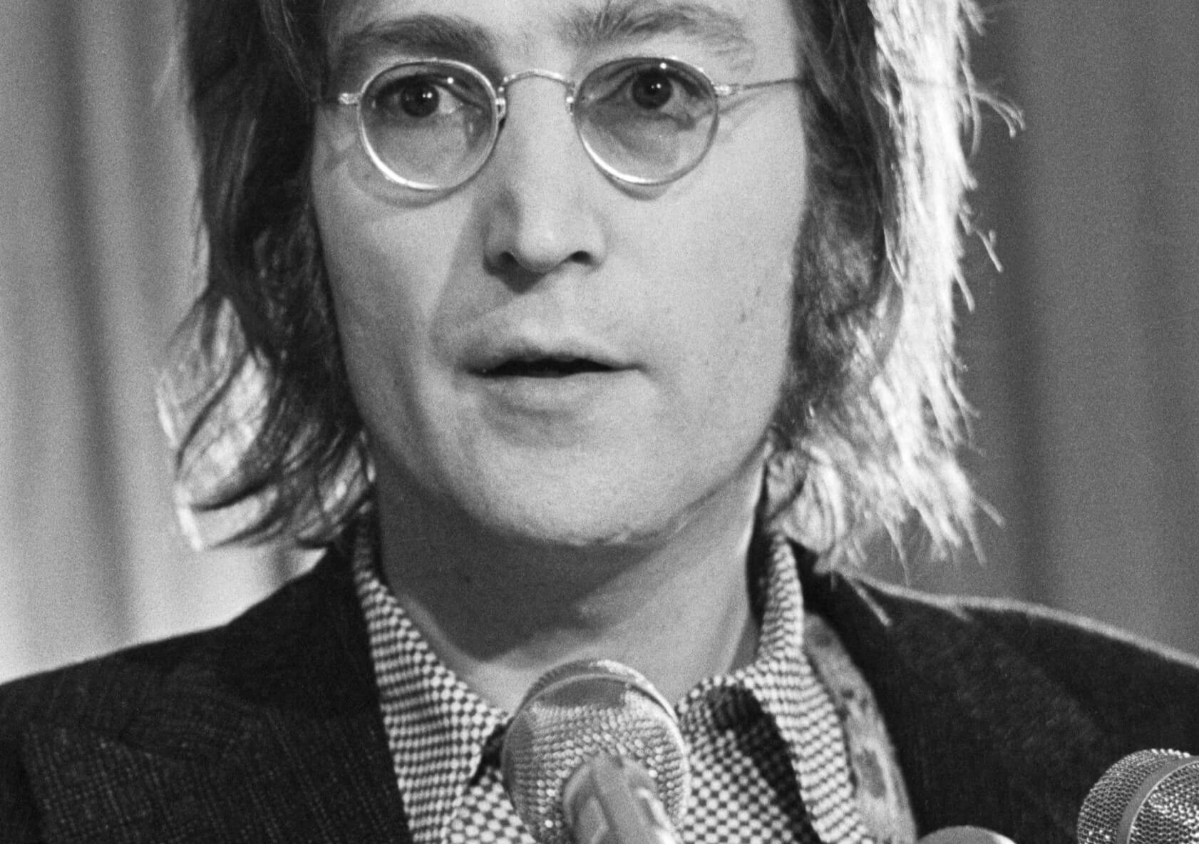 "Instant Karma!" singer John Lennon wearing glasses