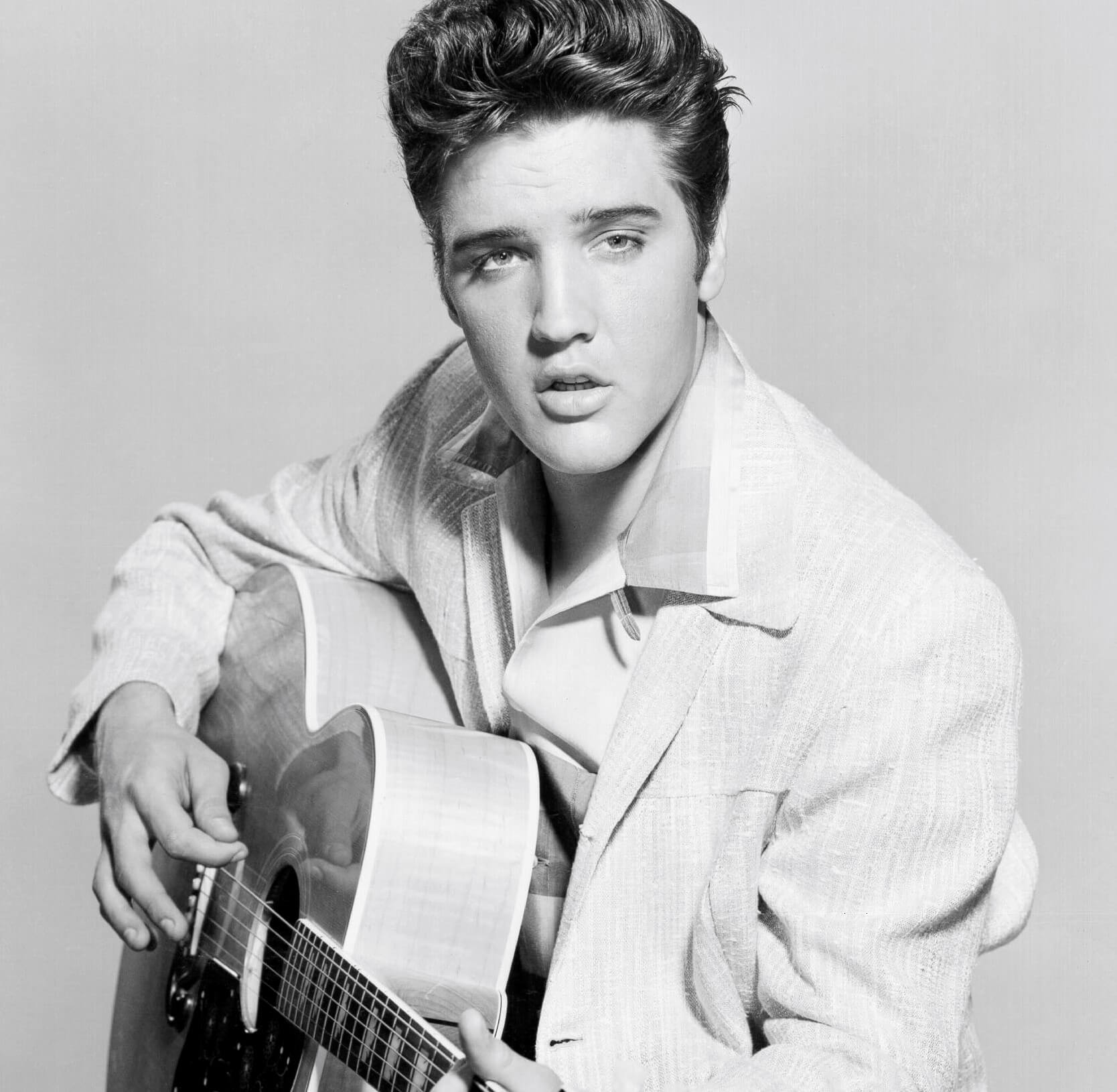 Elvis Presley with a guitar