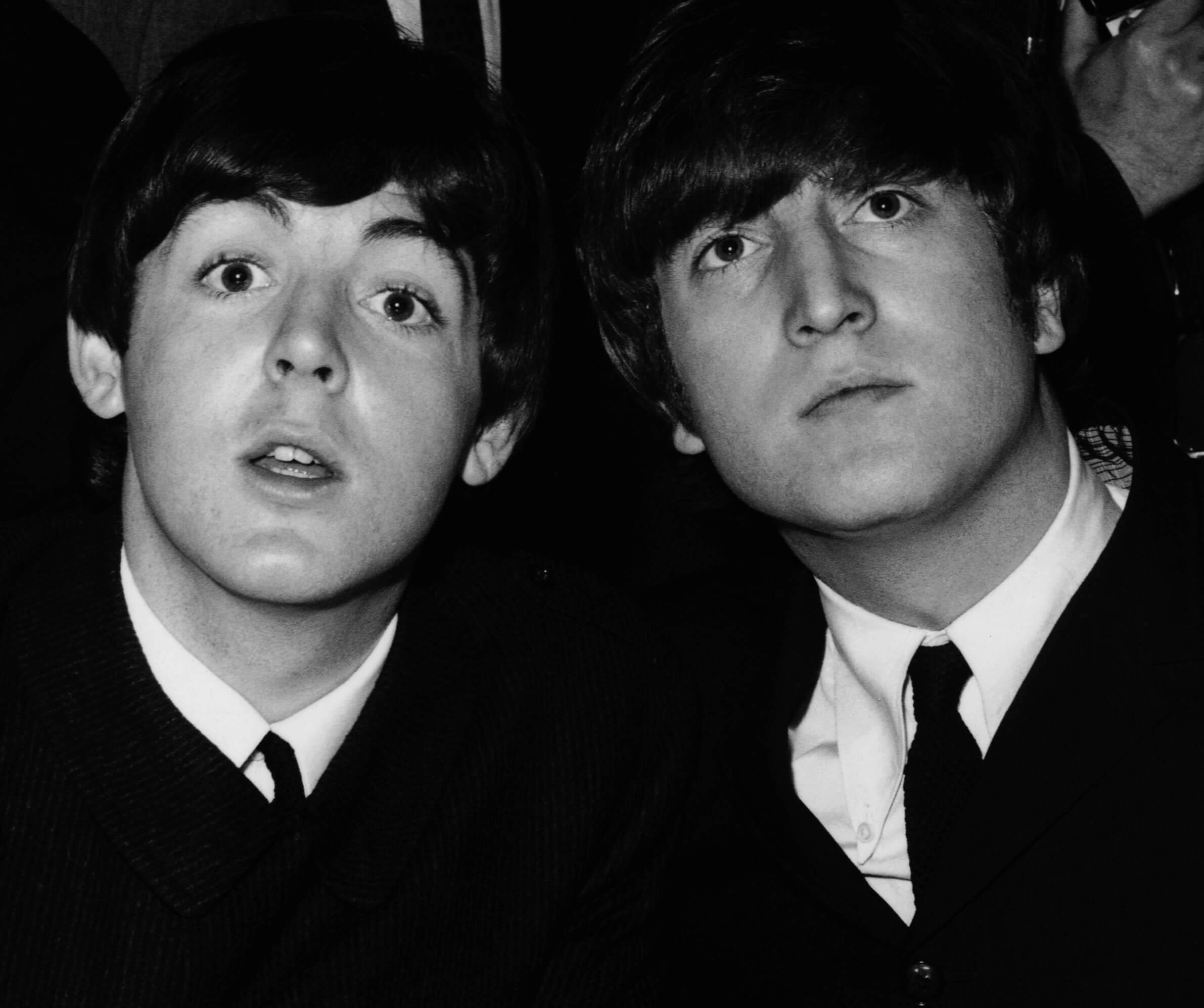 Paul McCartney and John Lennon in black-and-white