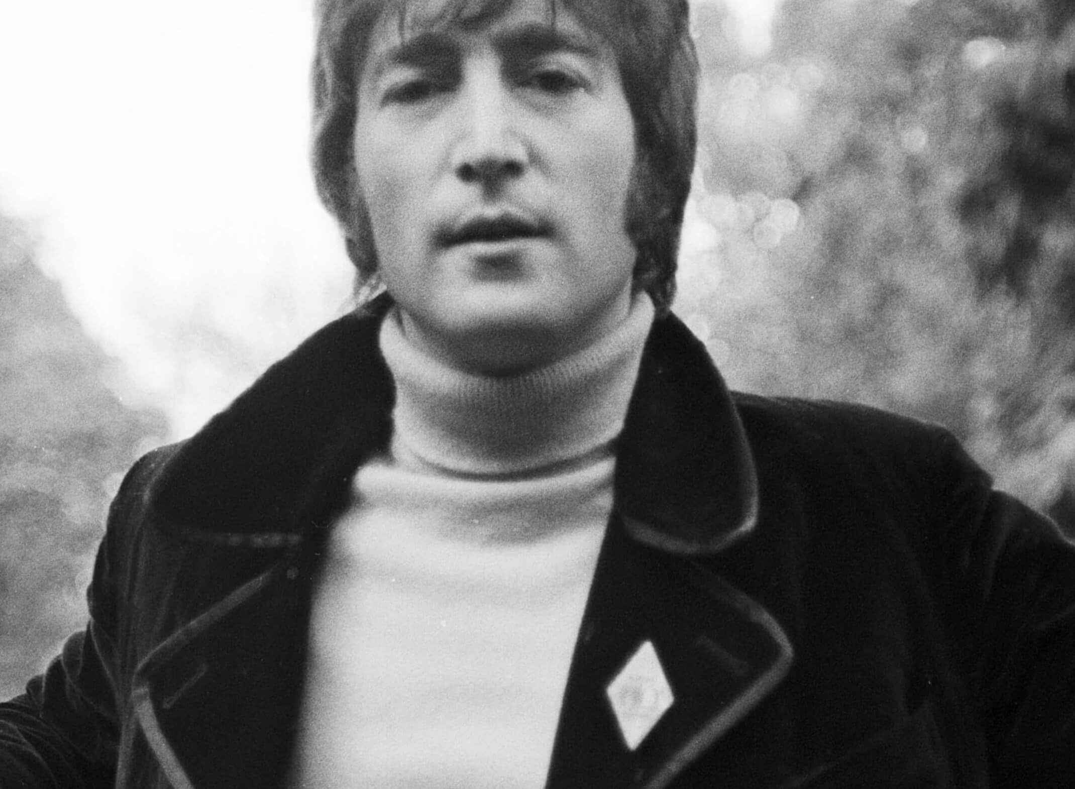 John Lennon in a sweater